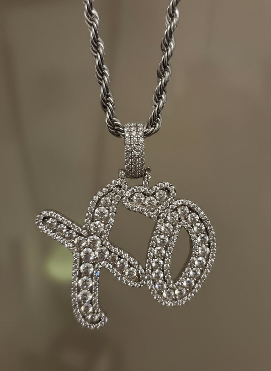 Silver xo necklace with a diamond-encrusted pendant xotwpd xo chans