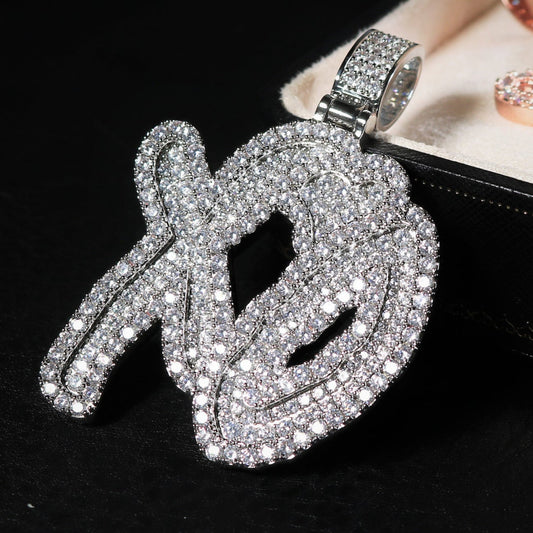 Silver pendant with gemstones on a black background