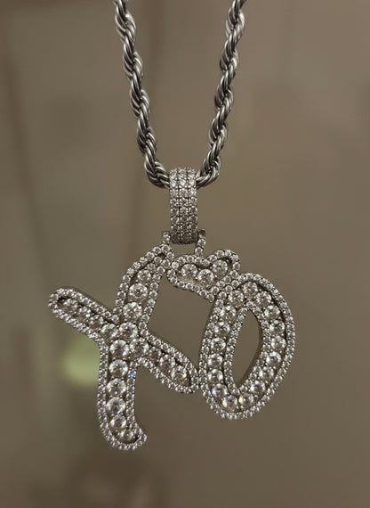 Silver xo necklace with a diamond-encrusted pendant xotwpd xo chans